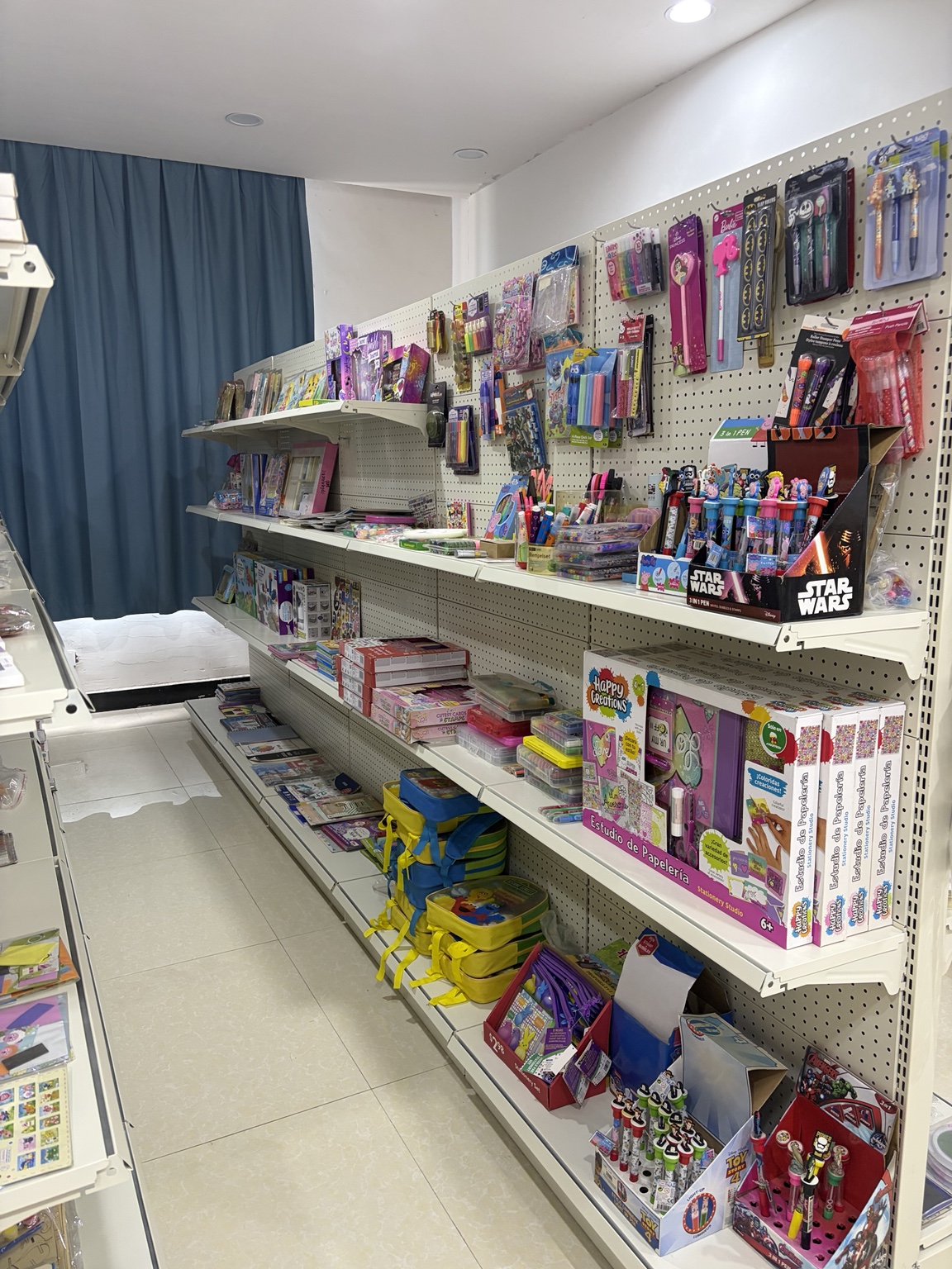 Sample room shelves with creative stationery and toy samples